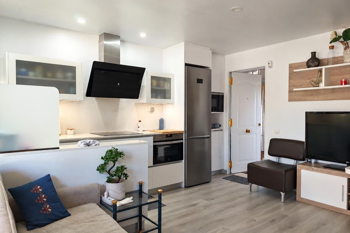 Living room with the kitchen behind