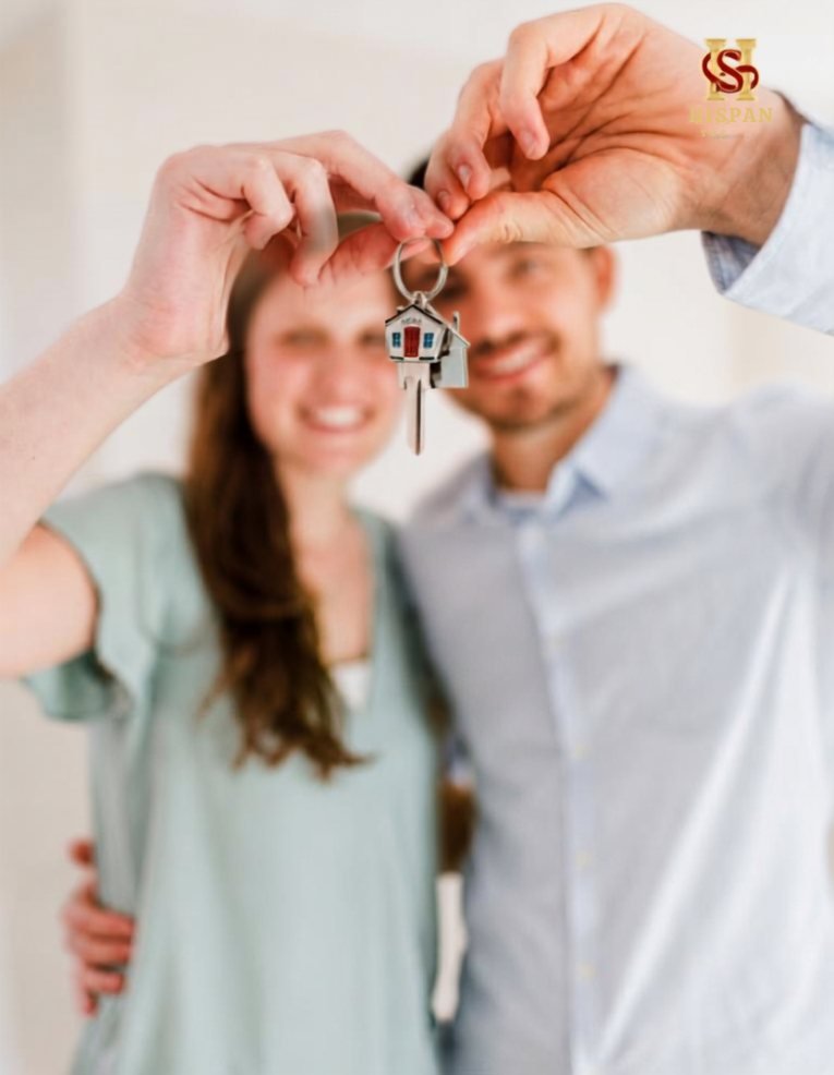 Happy couple holding keys to their new home